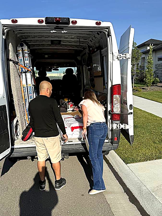 Consulting with a client at the service van before installation