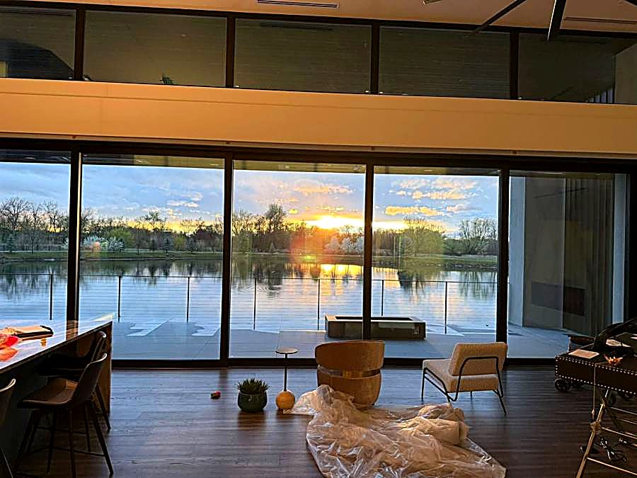 Floor-to-ceiling windows in a lakefront great room, project in progress